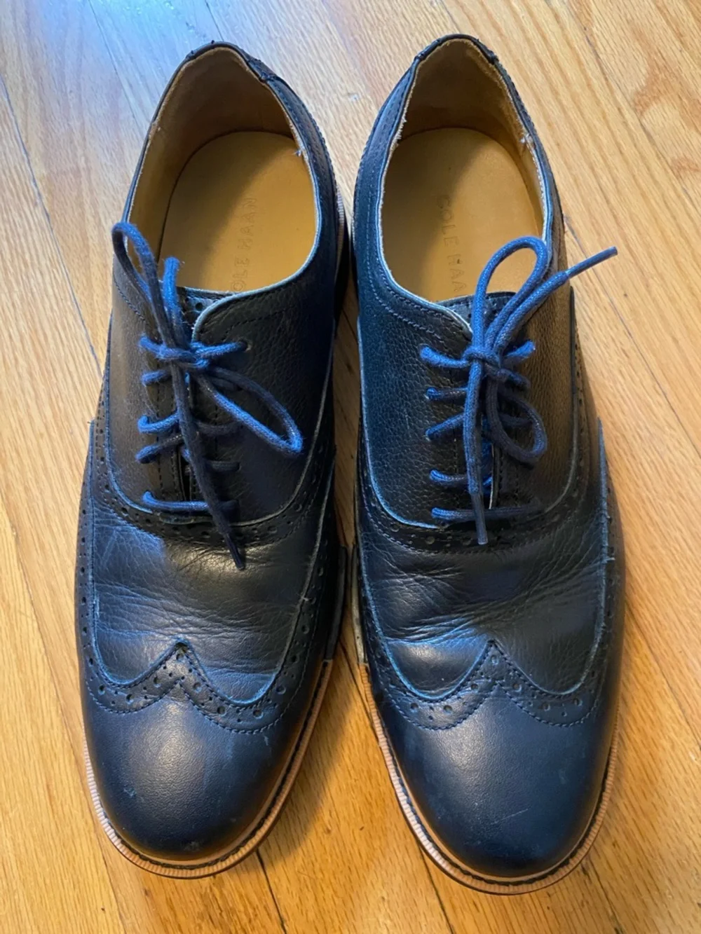 Cole Haan Black Leather Wingtip Oxfords with Tan Welt